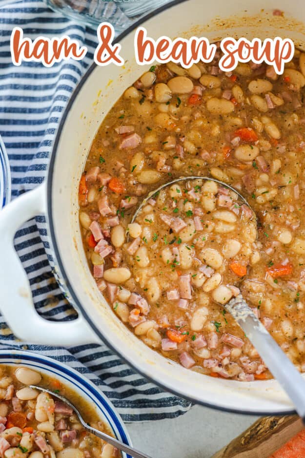 bean soup with ham in white dutch oven.