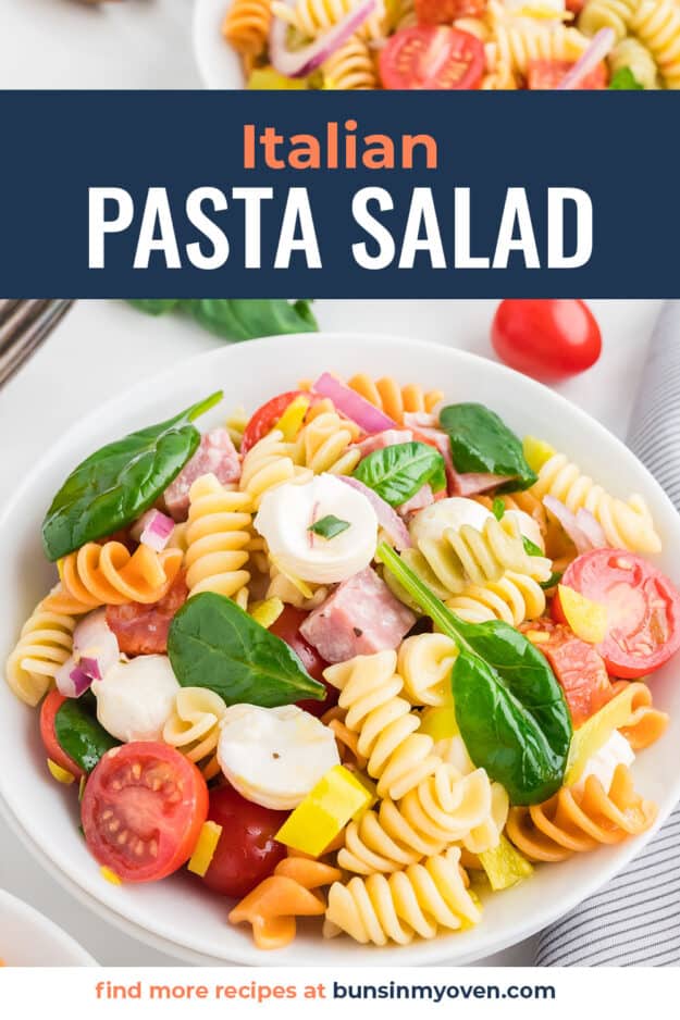 Italian pasta salad on white plate with text for Pinterest.