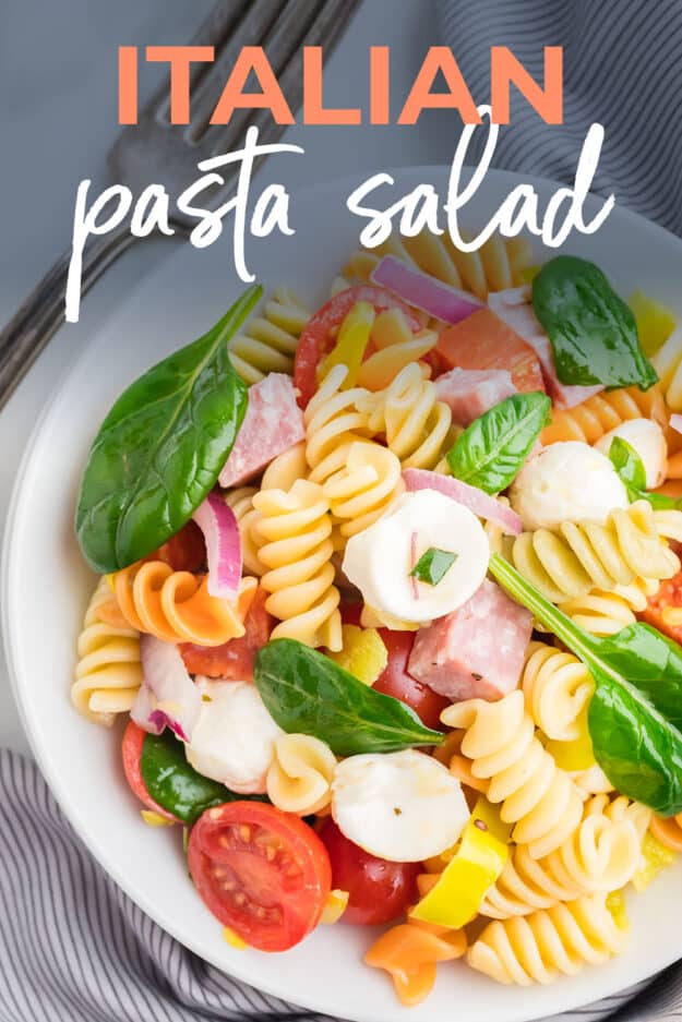 Italian pasta salad recipe on white plate.