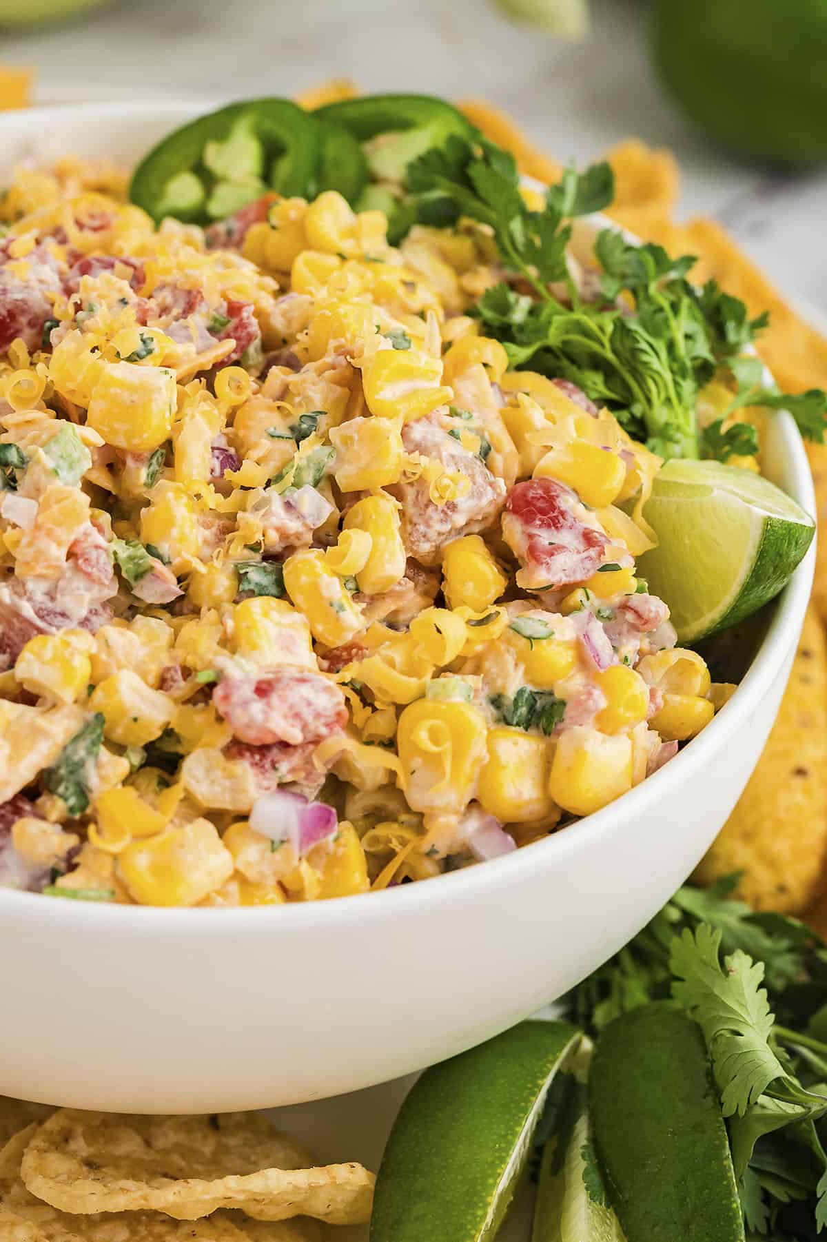 jalapeno corn dip on wooden tray