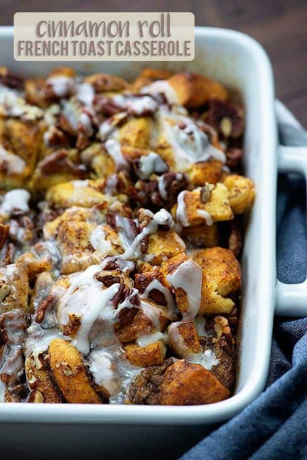 This cinnamon roll french toast casserole starts with a couple of cans of cinnamon rolls and bakes up into the tastiest french toast casserole ever!! Extra icing on mine, please!