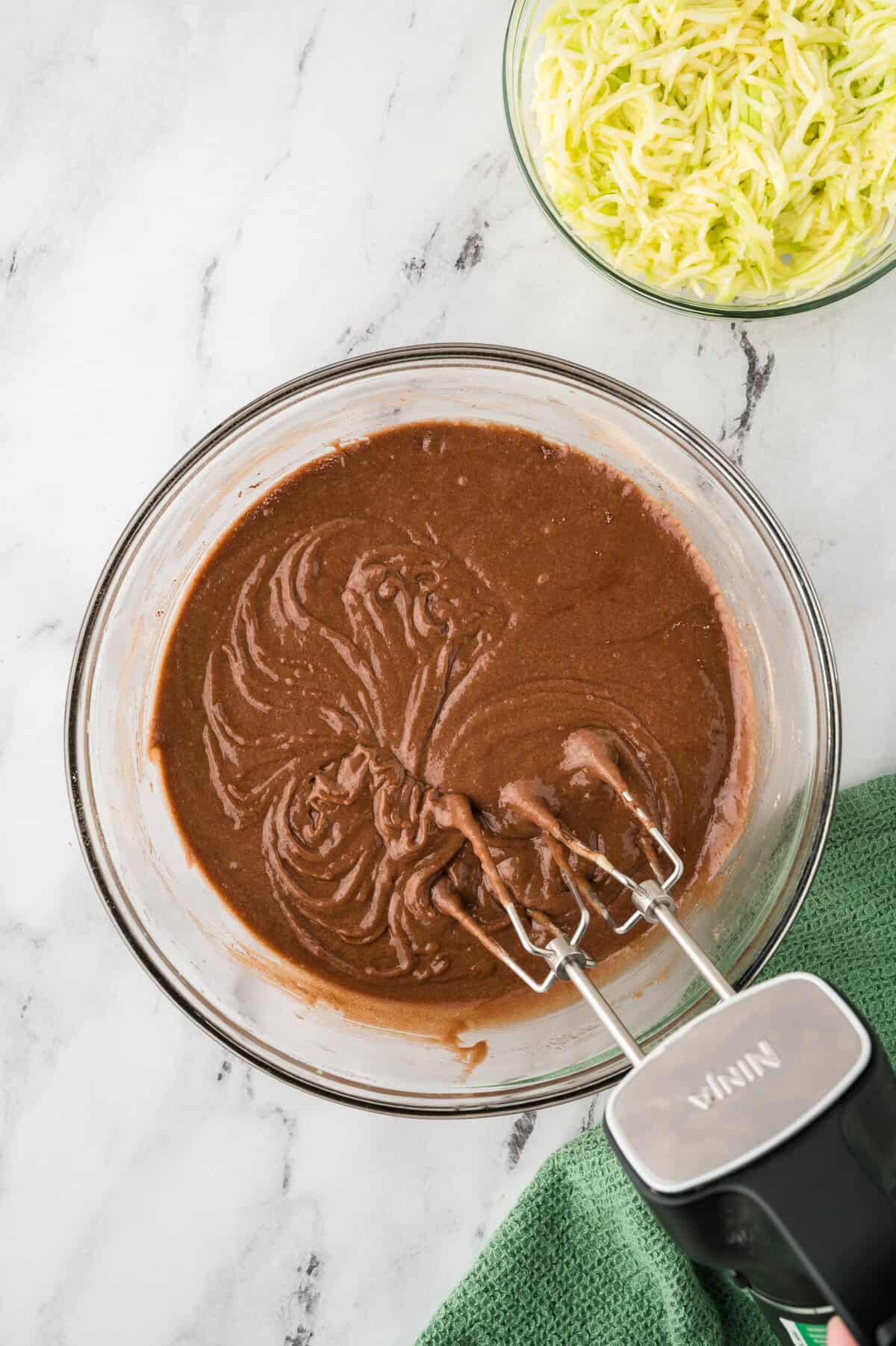 Chocolate zucchini bread batter in mixing bowl.