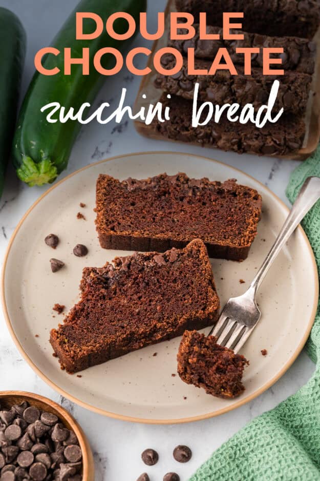 Slices of chocolate chocolate chip zucchini bread on place.