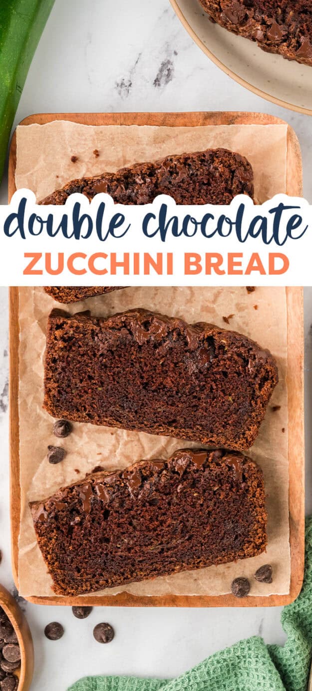 Sliced chocolate zucchini bread on wooden cutting board.