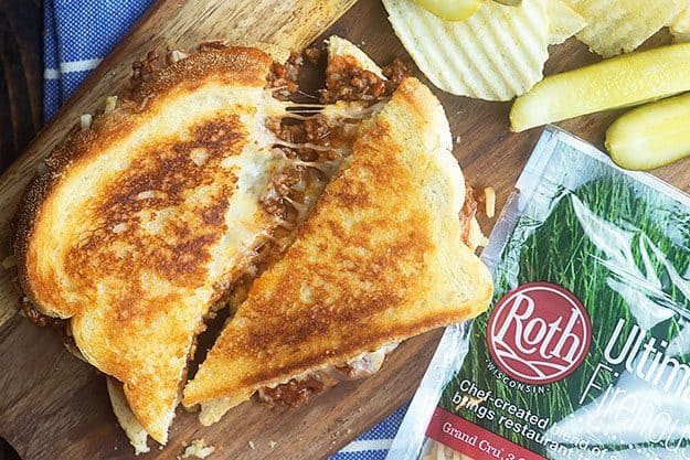 sloppy joe grilled cheese on wooden cutting board