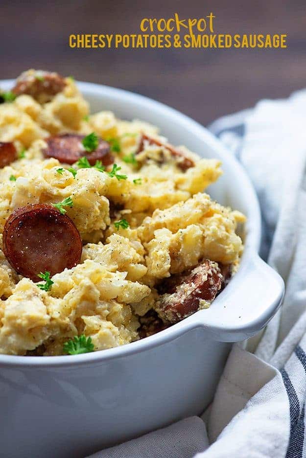 Slow cooker cheesy potatoes with smoked sausage!