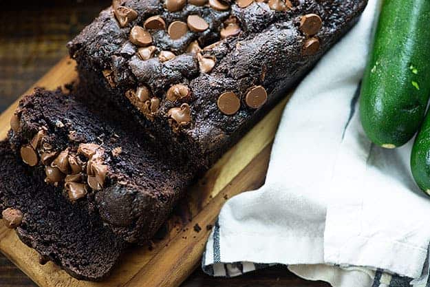 moist zucchini bread recipe on wooden board