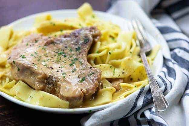 crock pot pork chops on white plate