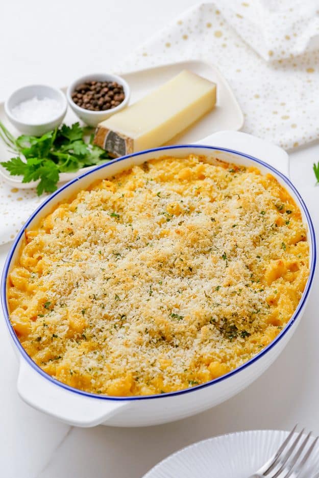 baked mac and cheese casserole in white dish.