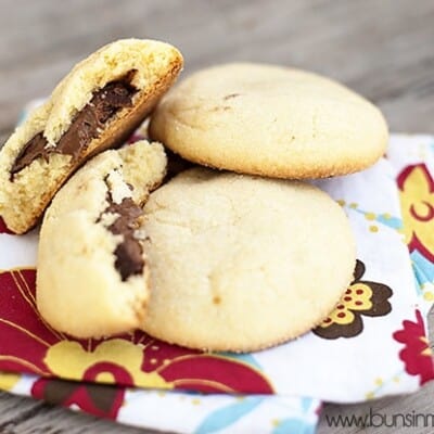 Three Nutella sugar cookies on a cloth napkin