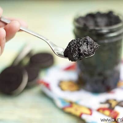 A spoonful of oreo cookie spread being held up to the camera.