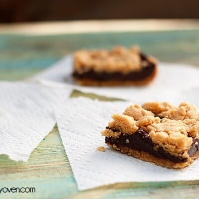 A  chocolate peanut butter bar on a paper towel.