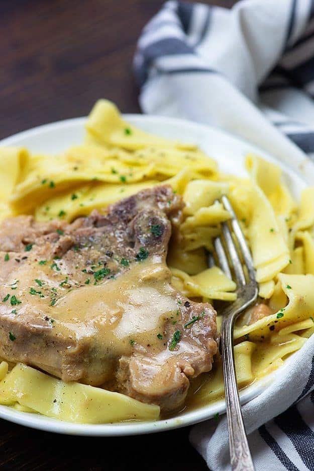 easy crock pot pork chops on white plate