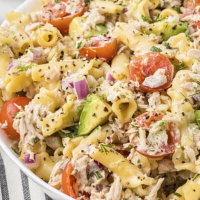 White bowl full of tuna pasta salad recipe.
