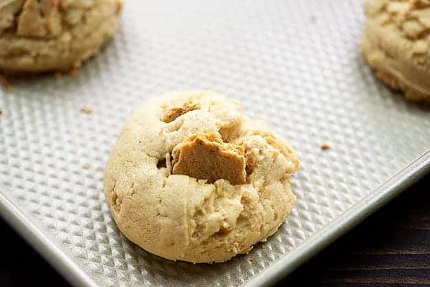 graham crackers in cookie dough on baking sheet