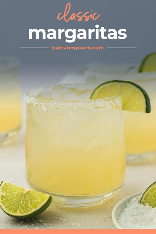 Margarita in glass with lime wedge.