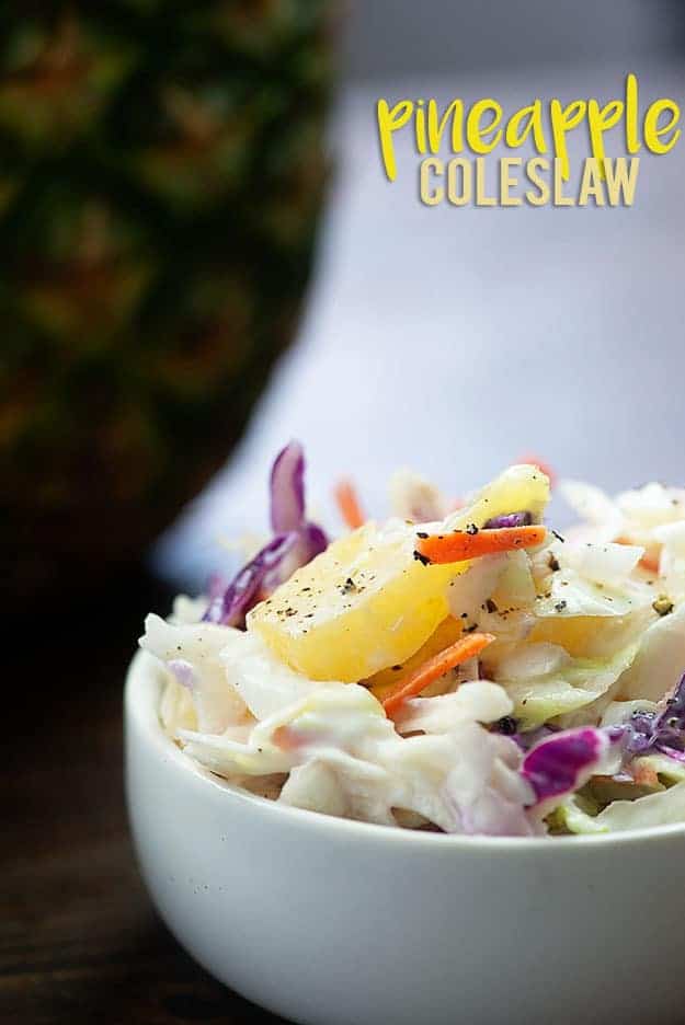 Pineapple coleslaw in a white bowl.