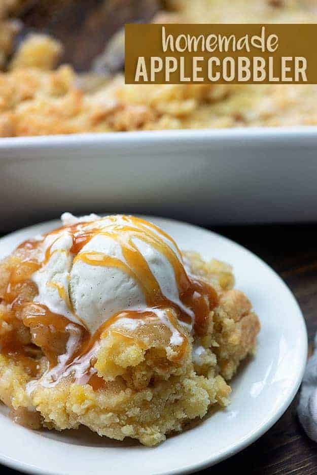Vanilla ice cream and caramel on top of a plate of cobbler.