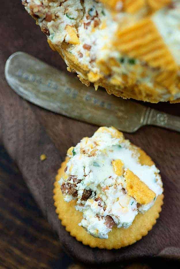 Ritz cracker topped with bacon cheese spread.