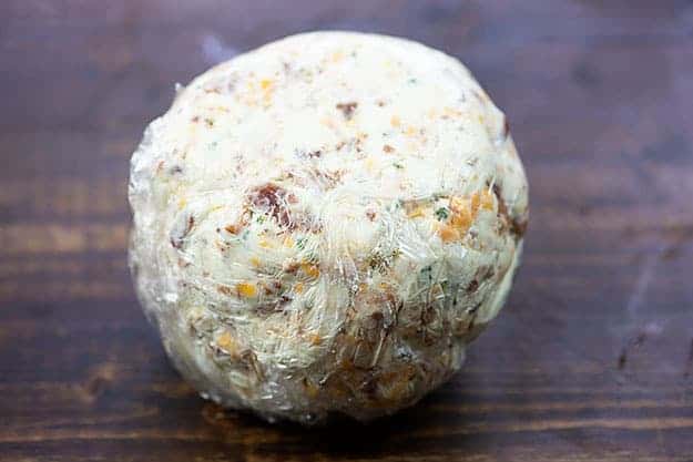 cheese ball in plastic wrap