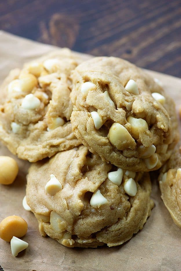 A close up of a stack of macadamia nut cookies.