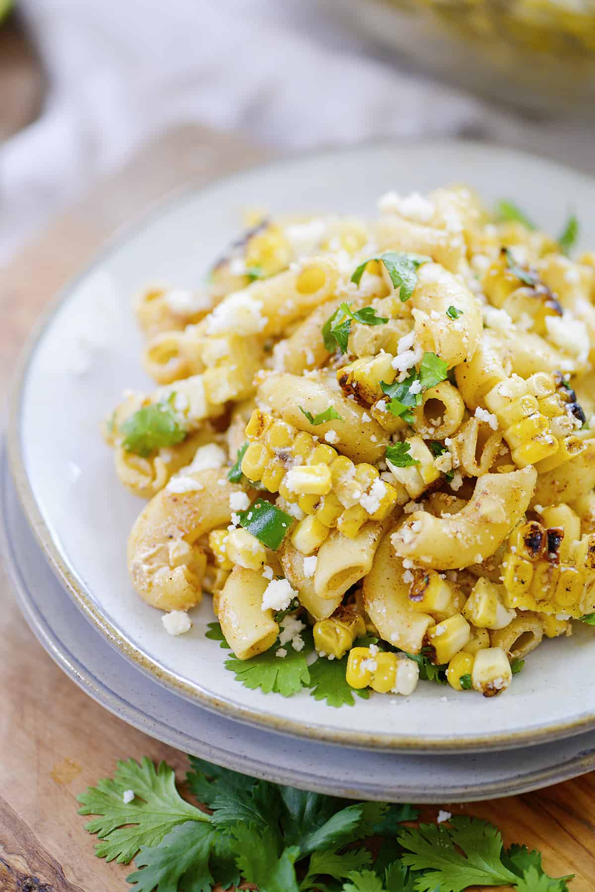 Mexican street corn pasta salad on small plates.