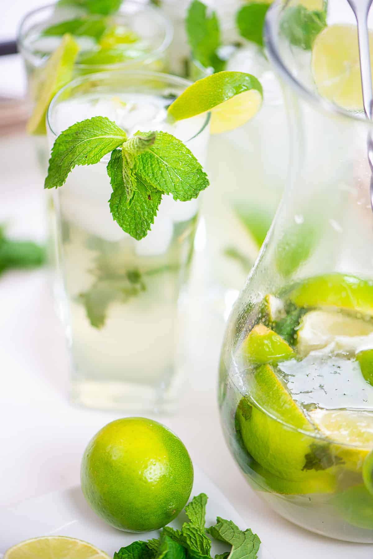 mojito in pitcher and glass.