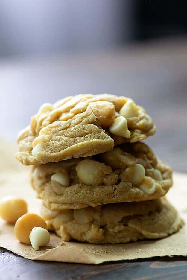 Stacked up macadamia nut cookies.