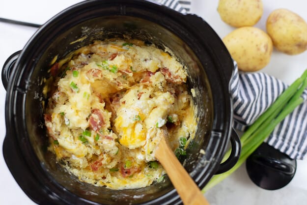 loaded mashed potatoes in crockpot.