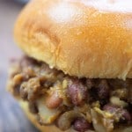 A close up of a sloppy joe sandwich.