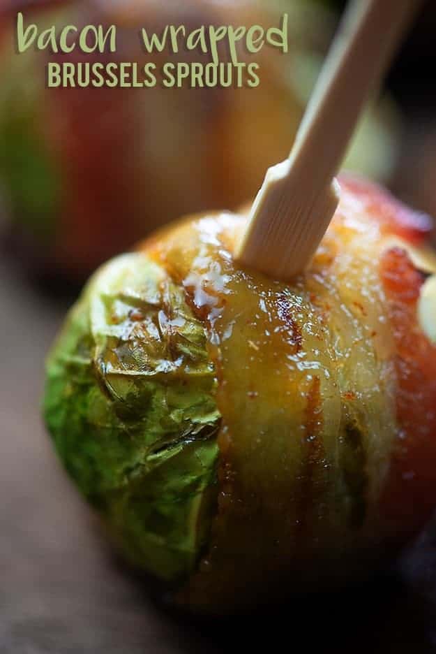 A close up of a brussel srpout cutting brushed with maple syrup.