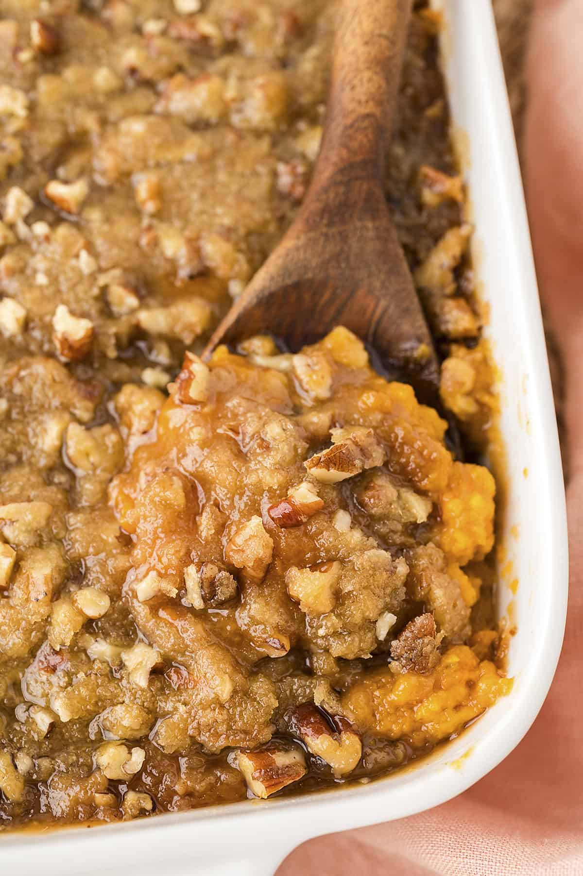 Sweet potato casserole in a white baking dish.