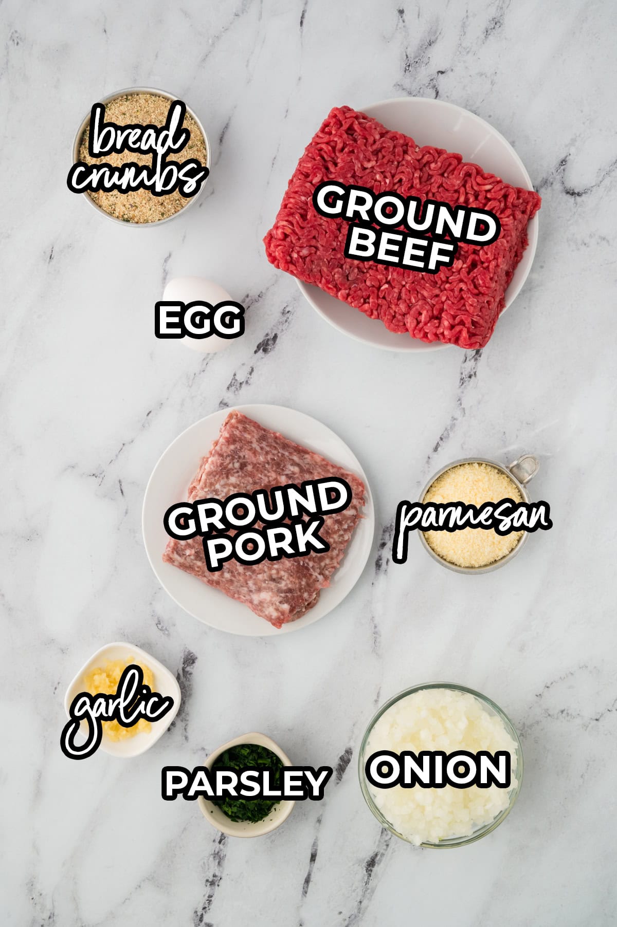 Ingredients for beef and pork meatballs to make meatball subs.
