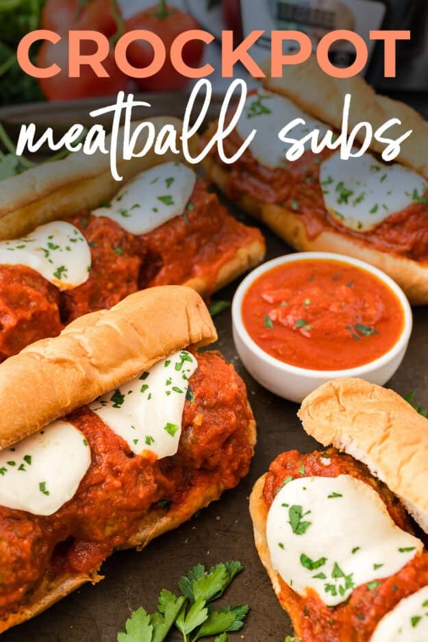 Crockpot meatball subs on baking sheet.