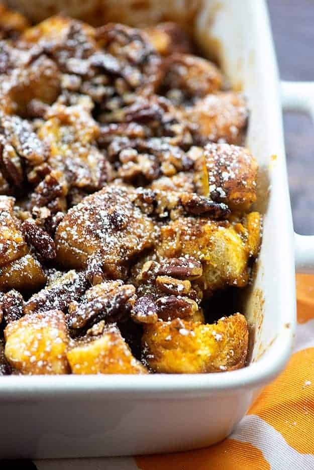 French toast casserole in a white baking pan.