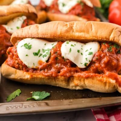 Close up of meatballs in a bun.