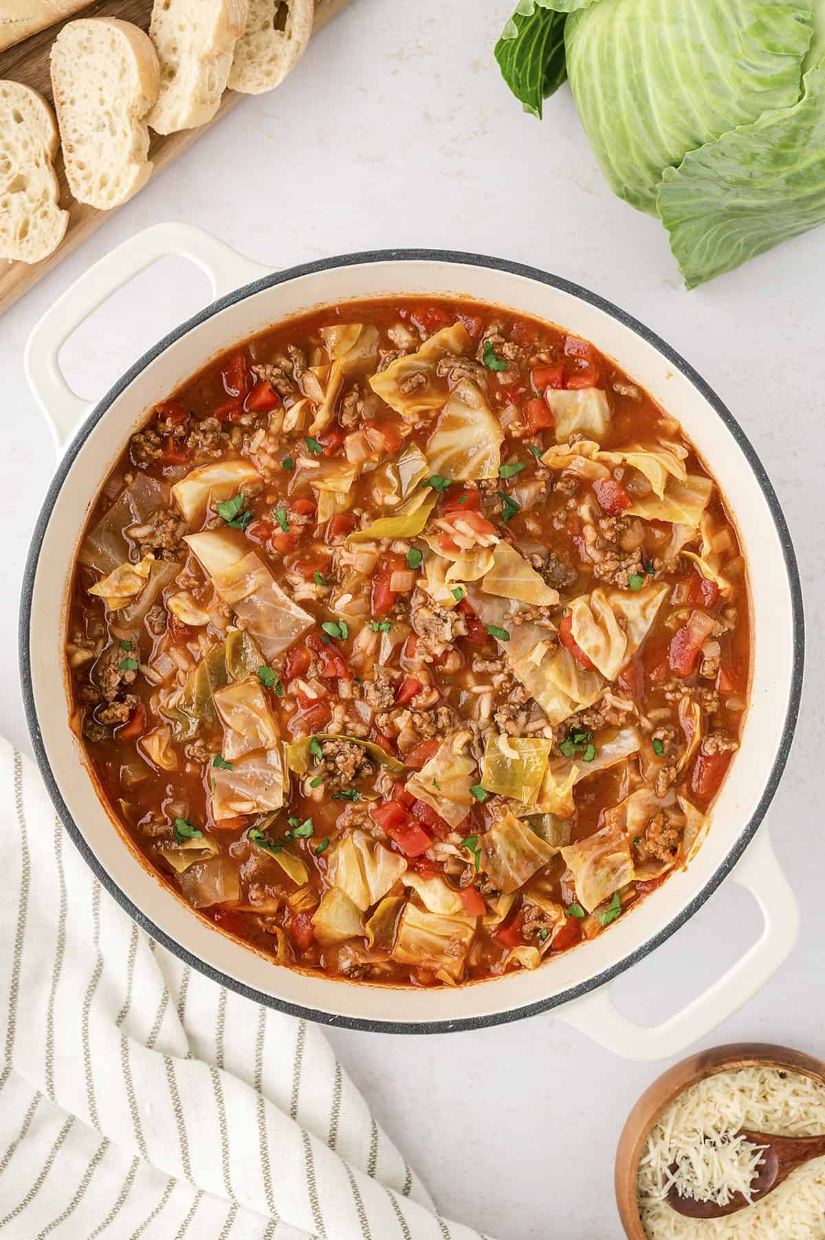 Cabbage roll soup recipe in white dutch oven.