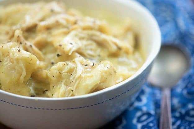 A bowl of chicken and dumplings.