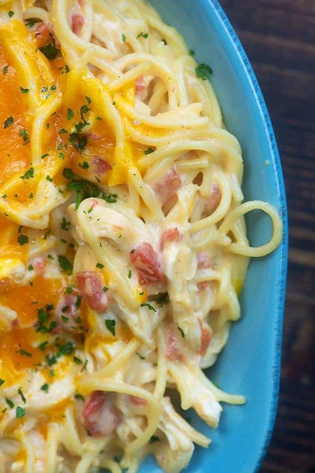 A close up of cheesy pasta in a bowl