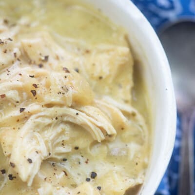 A bowl of chicken and dumplings.