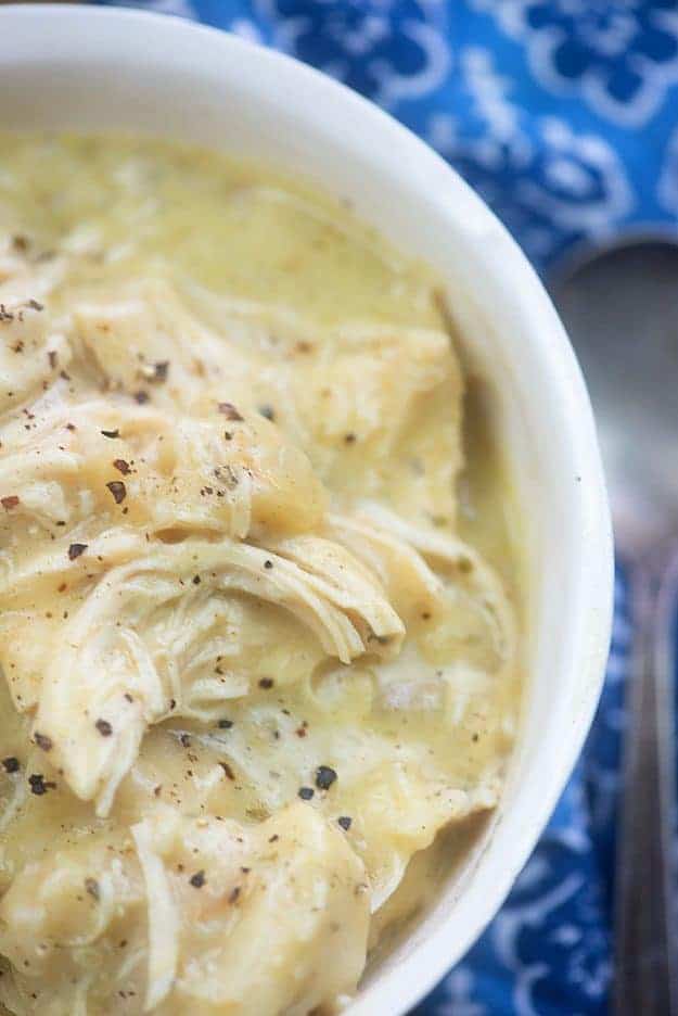 A bowl of chicken and dumplings.