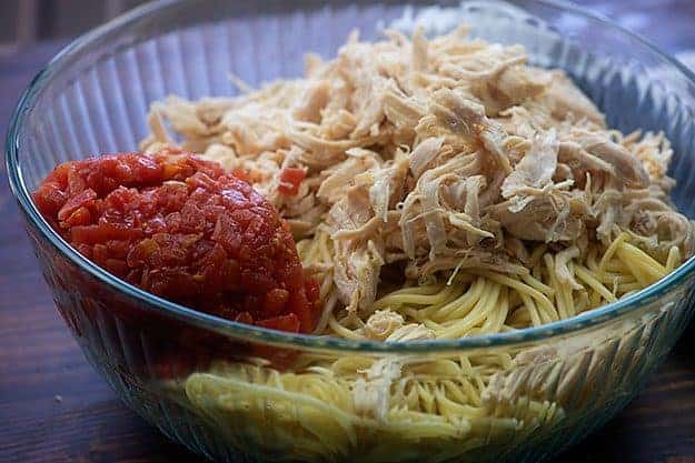 ingredients for chicken spaghetti in glass bowl