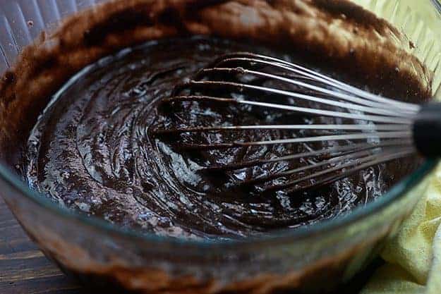 brownie batter in glass bowl