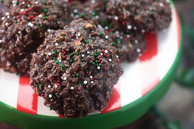 Several chocolate no-bake cookies on a cake stand.