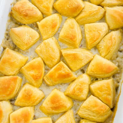Biscuits and gravy casserole in white baking dish.
