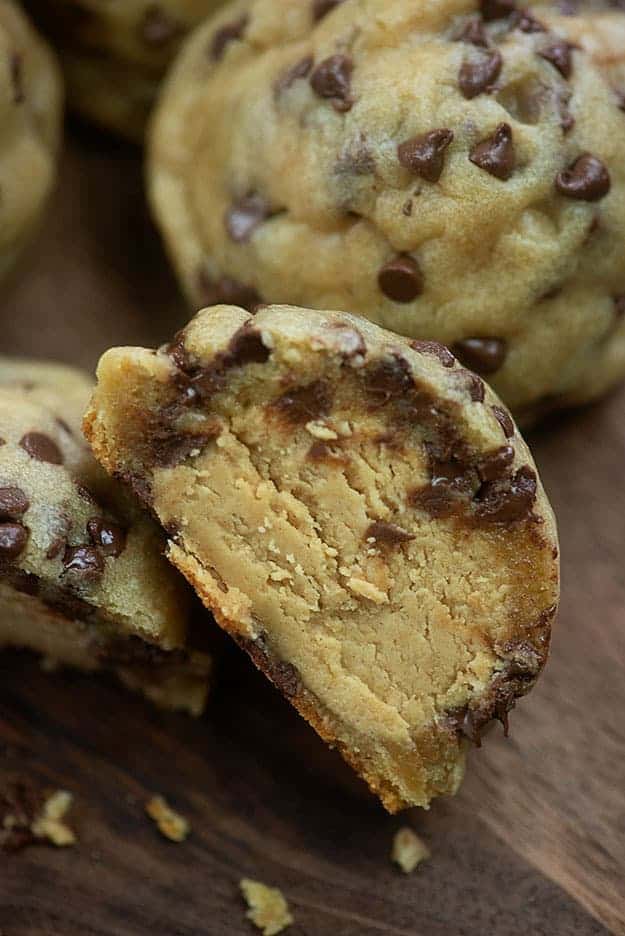 A close up of a stuffed chocolate chip cookie.
