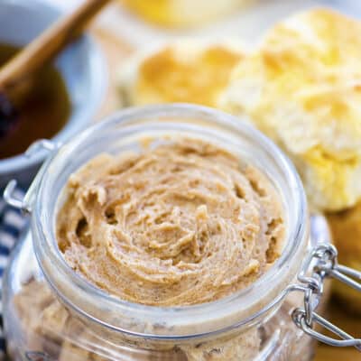 Cinnamon honey butter in glass jar.