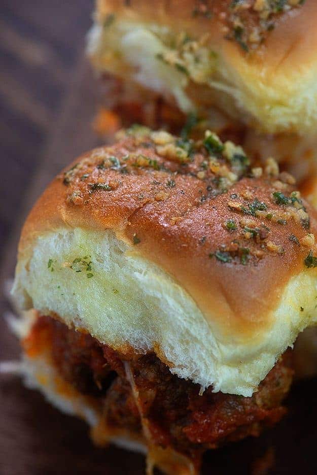 A close up of a meatball slider.