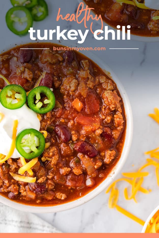 Overhead view of turkey chili in white bowl.