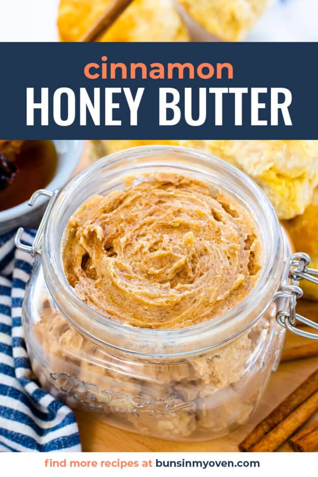 Glass jar full of butter with honey and cinnamon.
